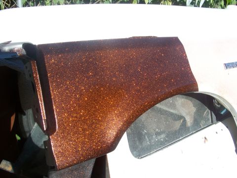 1989 Ford Bronco - This vehicle part features a unique metallic copper paint job with visible glitter flakes.