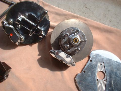1971 Ford Ranchero - Chrome brake assemblies laid out on a cloth surface, ready for installation.