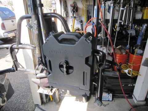 2008 Jeep Wrangler - A Rotopax fuel container is mounted to a custom metal frame, with a license plate in the background.