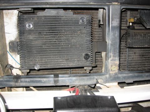 1995 Ford Bronco - just a front shot of the trans cooler with the plastic ties coming through. Cooler is a puller and on the backside.
