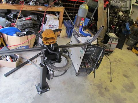 1995 Ford Probe - A workshop scene welding equipment, metal tubing, and various tools and supplies.