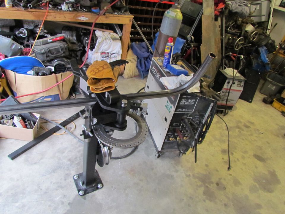 Welding equipment and metal tubing in a workshop