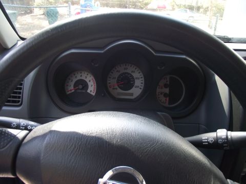 2004 Nissan Xterra - Interior view of a 2004 Nissan Xterra dashboard, showing the instrument cluster.