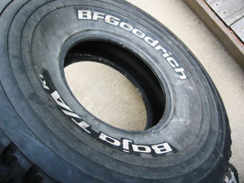 1986 Ford Bronco - A close-up view of a BFGoodrich Baja T/A tire, highlighting its distinctive white lettering.