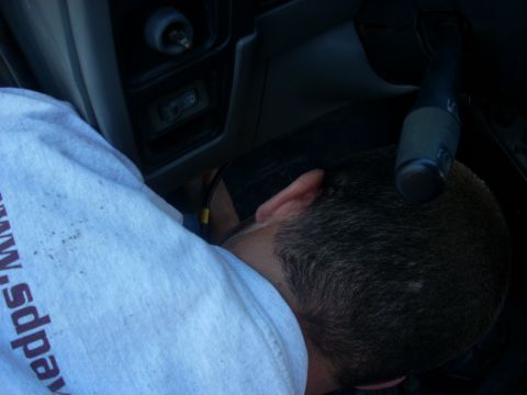 1992 Ford Ranger - A person's head is visible inside the vehicle's interior, near the dashboard.