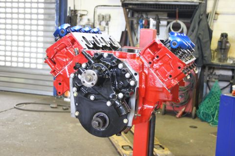 1973 Ford Ranchero - Ford V8 engine on a stand, likely a 400ci, in a workshop setting.