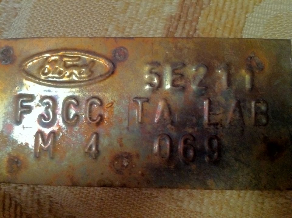Ford VIN plate with F3CC TA LAB M 4 069 and 5E211 markings