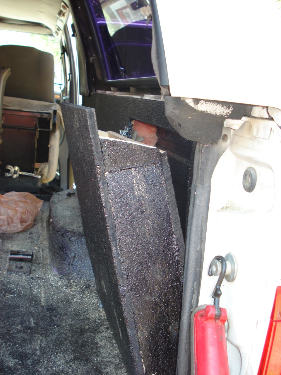 Interior paneling and insulation in a vehicle