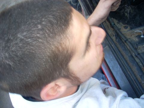 1992 Ford Ranger - A person's head is in the foreground, looking into the interior of a vehicle where wiring is visible.