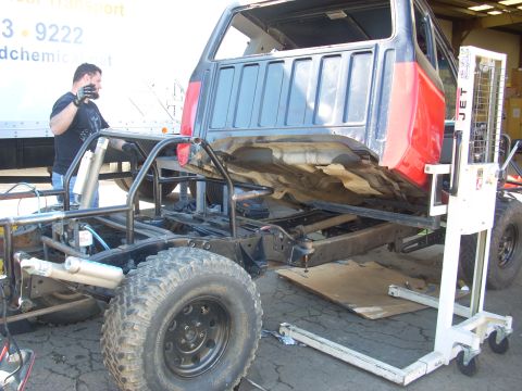 1992 Ford Ranger - Custom truck chassis with roll cage and partial body panels under construction.