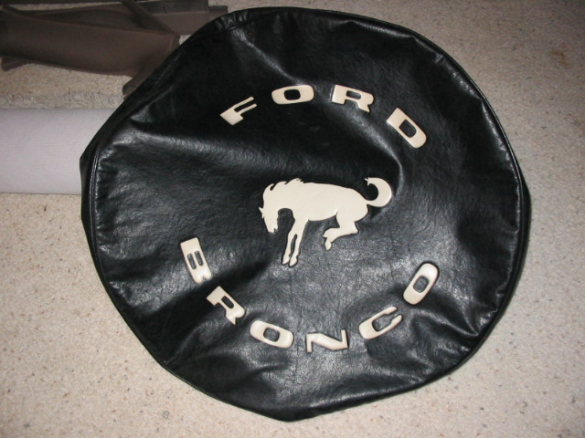 Black vinyl Ford Bronco spare tire cover with running-horse logo