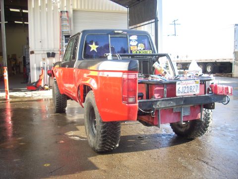 1992 Ford Ranger - This 1992 Ford Ranger pickup truck is modified with a flatbed and off-road tires.