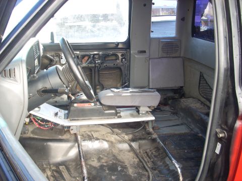 1992 Ford Ranger - Interior view of a 1992 Ford Ranger, highlighting the dashboard and seating area.