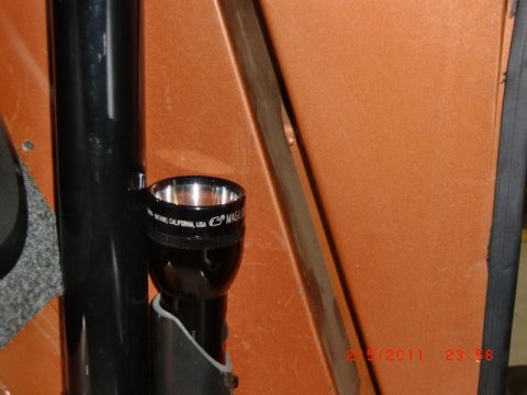 1973 Ford Bronco - A Maglite flashlight is mounted inside the vehicle's interior.