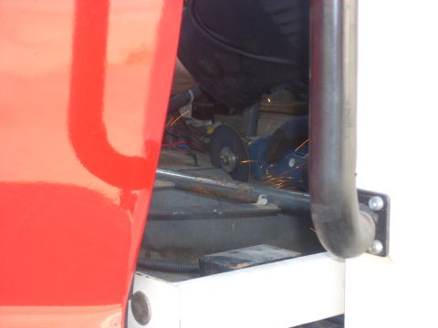 1992 Ford Ranger - Metal fabrication in progress, with sparks flying from a grinder.