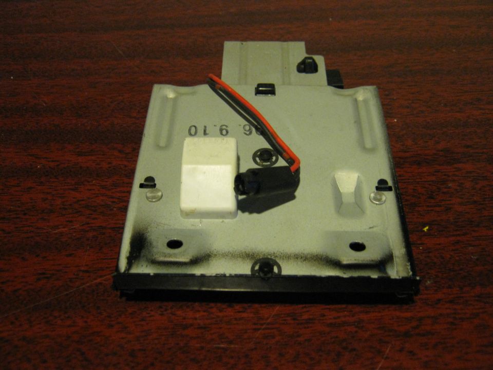 Ashtray bracket with lamp. Bulb missing.