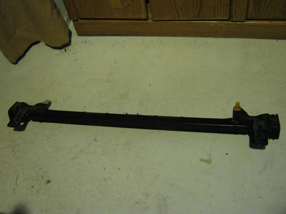 Radiator support/prop rod. Thought I had lost it. Pretty sure this is from the L wagon, so for a smaller radiator.