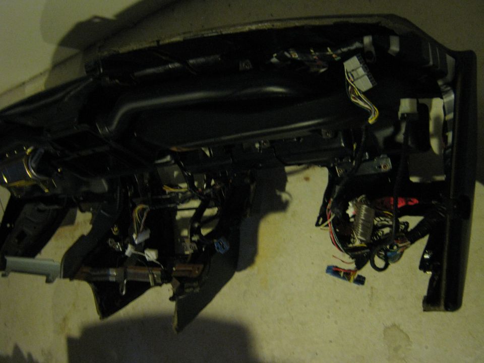 Close up of dash. Some wires cut. Can't remember why....