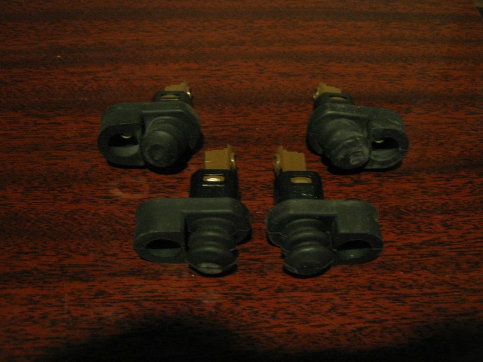 Door ajar switches. Some wear to the fronts, but they all work.