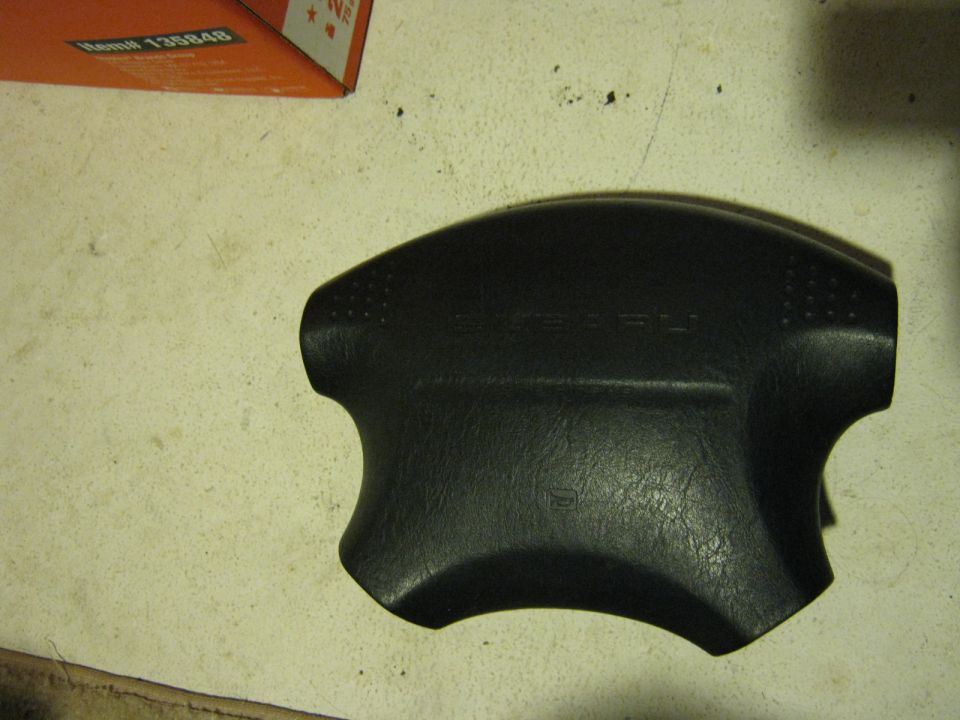 Black driver airbag steering wheel cover module