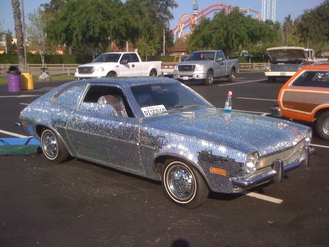 1996 Ford C-350 (Centurion Conversions) - This car is covered in mirrored tiles, resembling a disco ball, with a license plate that says DISCOGO.