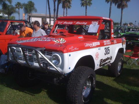 1996 Ford C-350 (Centurion Conversions) - This modified Ford Bronco, number 305, is equipped for off-road racing with a custom bumper and roll cage.