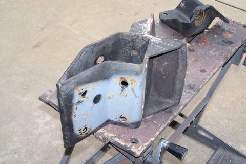 2000 Ford F-150 - These are some old truck suspension parts that appear to be in need of restoration.