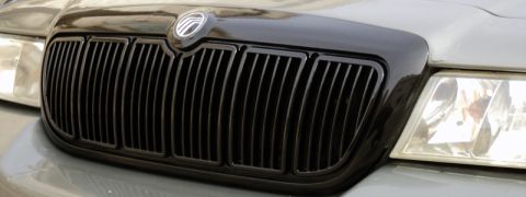 2001 Mercury Grand Marquis - Front view of a 2001 Mercury Grand Marquis grille with a Supermotors watermark.