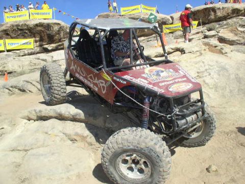 1979 Ford Bronco - This off-road buggy is equipped with BFGoodrich tires and appears to be on a challenging course.