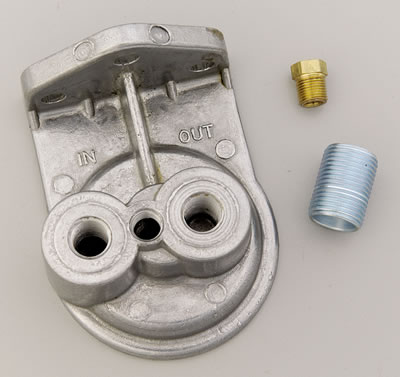 1990 Ford Bronco - An aluminum oil filter housing and its associated fittings are shown against a neutral background.