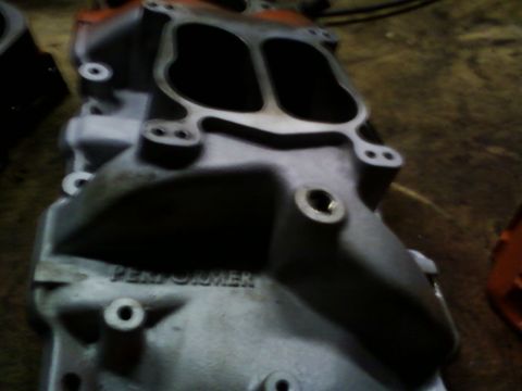 1989 Chevrolet Camaro - Close-up of an aluminum intake manifold, identified by the 'PERFORMER' casting.