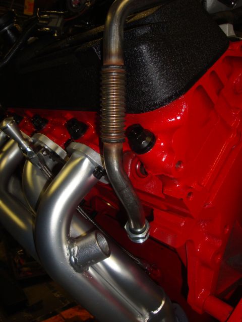 1989 Ford Bronco - Engine block and exhaust headers, likely part of a custom build or restoration project.
