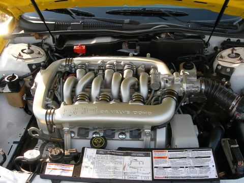 1993 Ford Taurus - The SHO 24 Valve DOHC engine from a 1993 Ford Taurus is shown with its intake manifold and associated components.