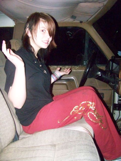 1989 Ford Bronco - A person sits in the driver's seat of a vehicle, gesturing with their hands.