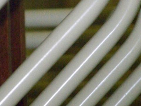 1989 Ford Bronco - Detail shot of pipes, possibly from a vehicle's exhaust system.