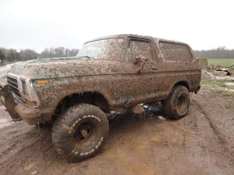 1979 Ford Bronco - This 1979 Ford Bronco is completely covered in mud after an off-road adventure.