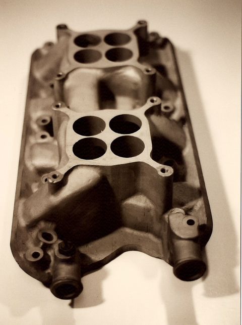 1973 Ford Mustang - This is a dual-plane intake manifold, a component of a vehicle's engine.