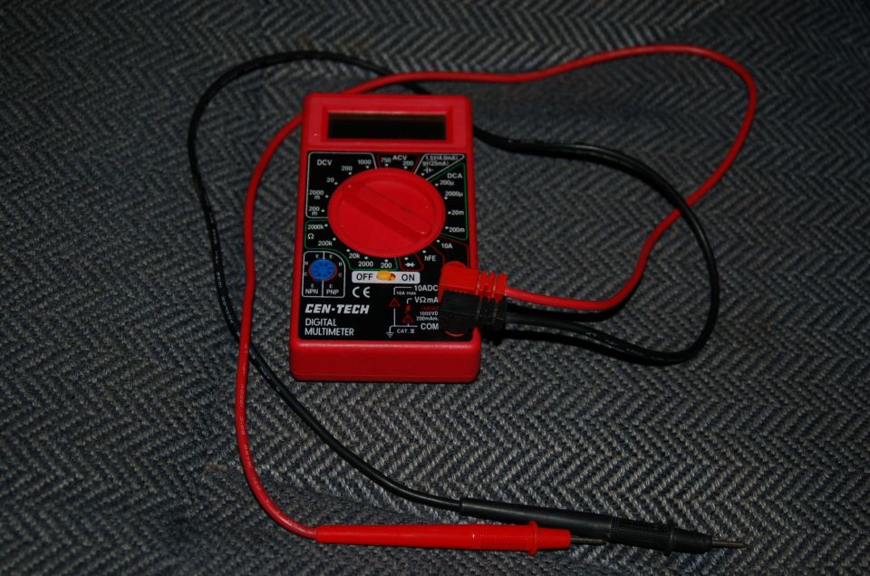 Cen-Tech red digital multimeter with test leads