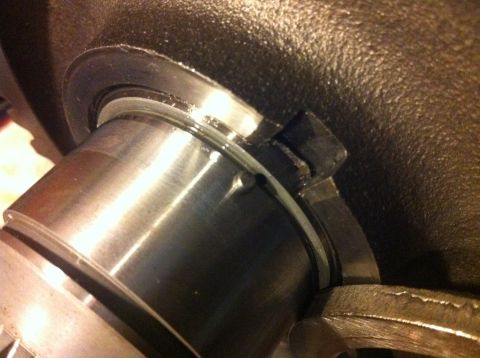 1989 Ford Bronco - This image shows a close-up view of a mechanical part, likely from a vehicle's drivetrain, with a seal in place.