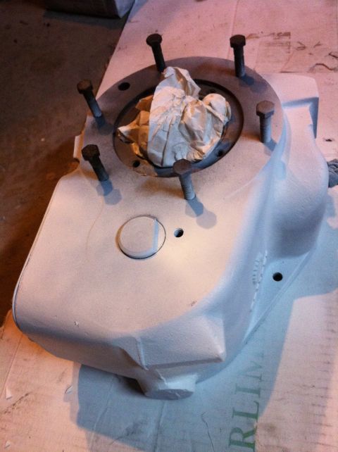 1989 Ford Bronco - A close-up view of a painted transfer case housing, ready for installation or repair.