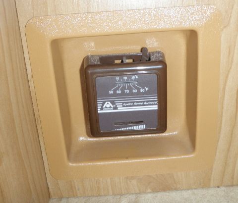 2007 Dodge 2500 - RV interior showing a thermostat for the Atwood hydro flame furnace.
