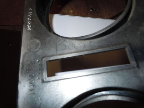 1970 Chevrolet Camaro - Close-up of a gauge cluster part, showing "Ban" and "CAV2" markings.