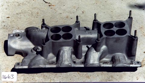 1973 Ford Mustang - This is an aluminum intake manifold, likely for a V8 engine, with visible casting marks.