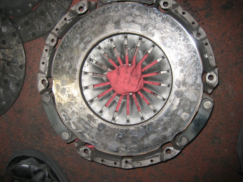 Clutch pressure plate with diaphragm spring fingers painted red