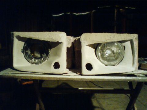 1989 Ford Bronco - Custom headlight housings are being prepared for installation on a vehicle.