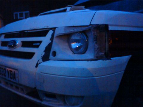 1989 Ford Bronco - Front view of a white 1989 Ford Bronco, showing the grille, headlights, and license plate.