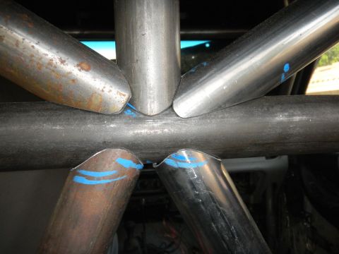 1997 Ford Ranger - Roll cage tubing with blue paint marks, likely for installation alignment.