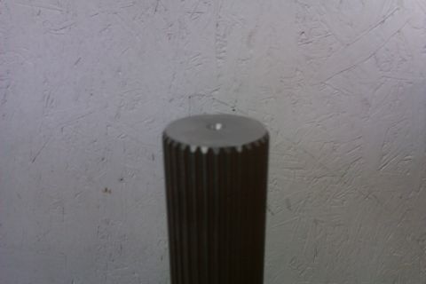 1999 Chevrolet Camaro - A close-up view of a splined shaft, a component likely from a vehicle's drivetrain.