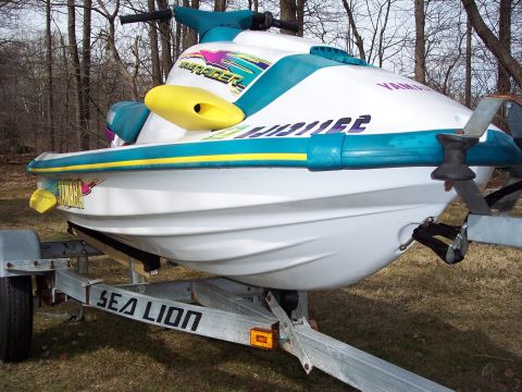 1996 Yamaha RA760 WaveRaider 2-P - Jet ski on a trailer, showing the side and front-right quarter view with 'WaveRaider' graphics.