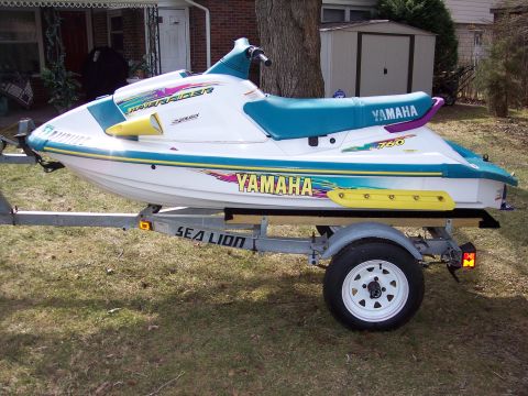 1996 Yamaha RA760 WaveRaider 2-P - Side view of a 1996 Yamaha RA760 WaveRaider 2-P jet ski on a trailer.